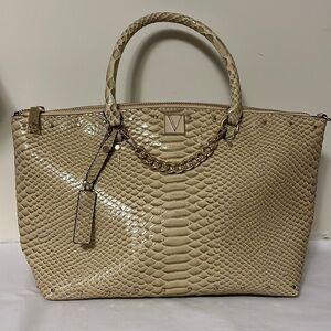 Victoria’s Secret tan reptile faux leather bag with gold hardware, mirror